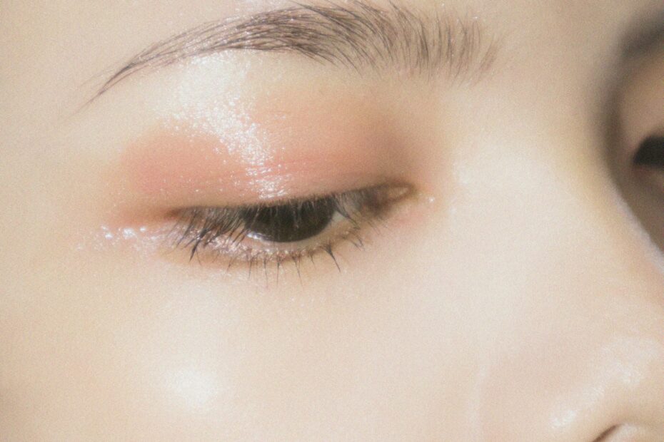 a close up of a woman's eye with makeup